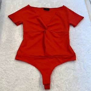 Bebe never worn bright red body suit size small